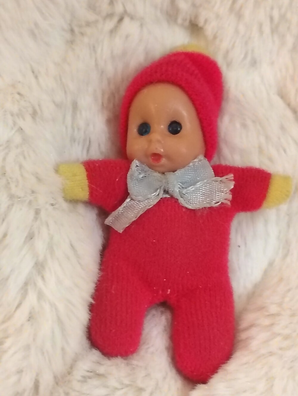 Vintage 1970s-1980s Matchbox Mini Baby Beanie Doll in red knit outfit